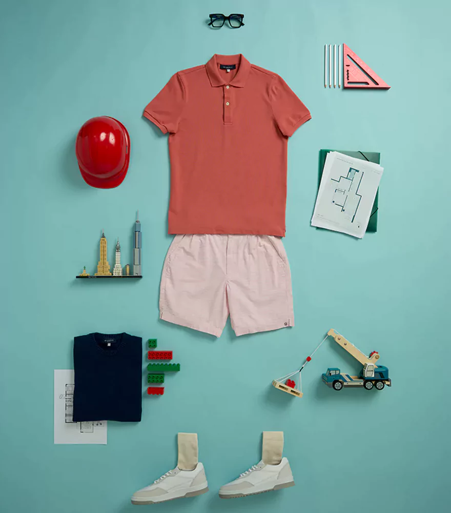 Apparel and accessories photo on blue background with natural shadows.