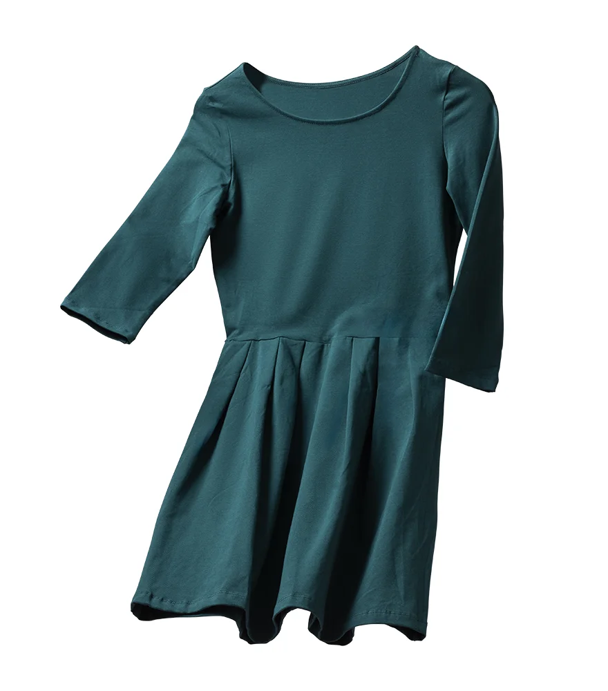 Green dress with neckline digitally reconstructed and isolated on white.