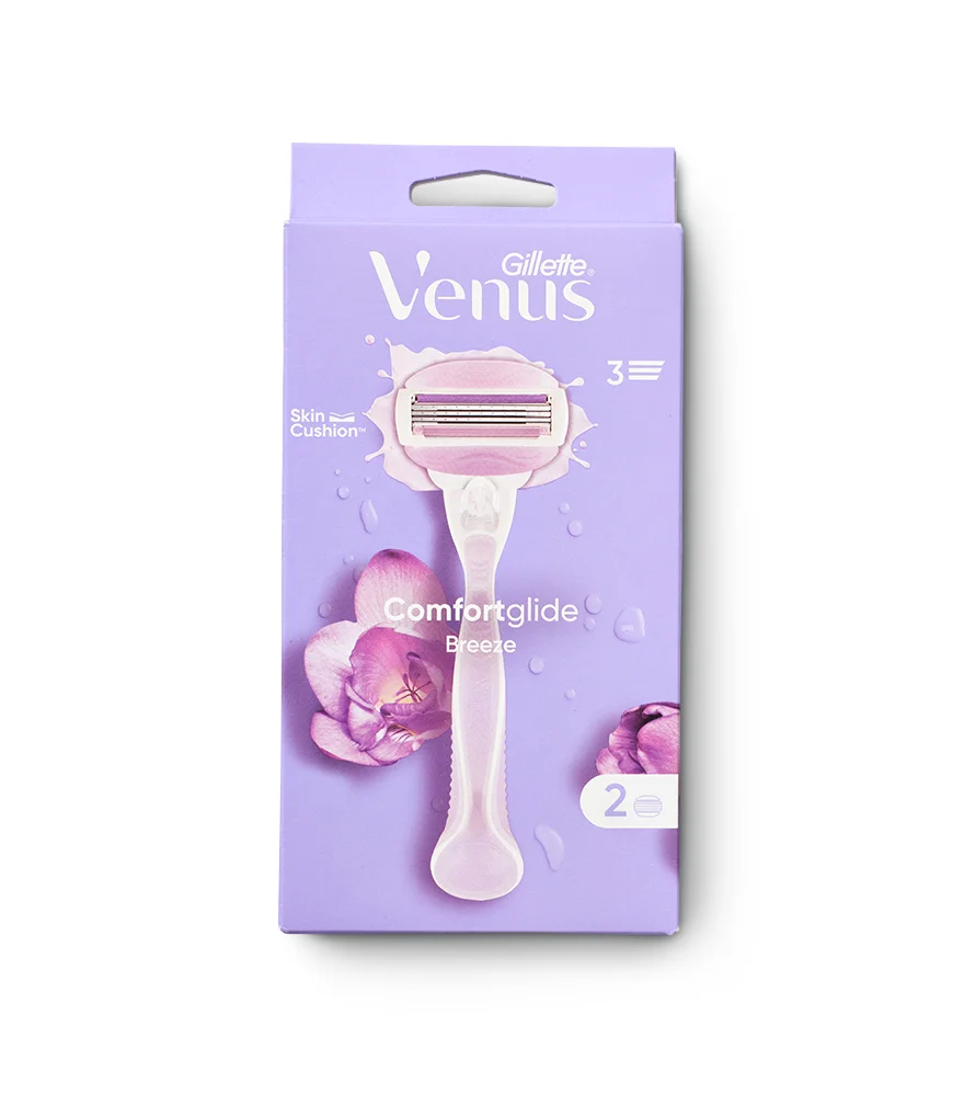 Flat product packaging of razor against dull gray background without natural shadow.