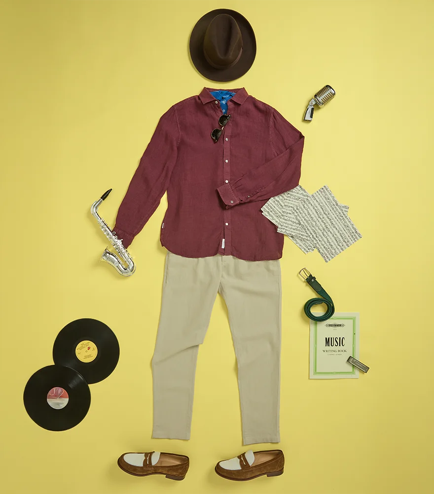 Jazz-themed outfit and props laid out on a yellow background.