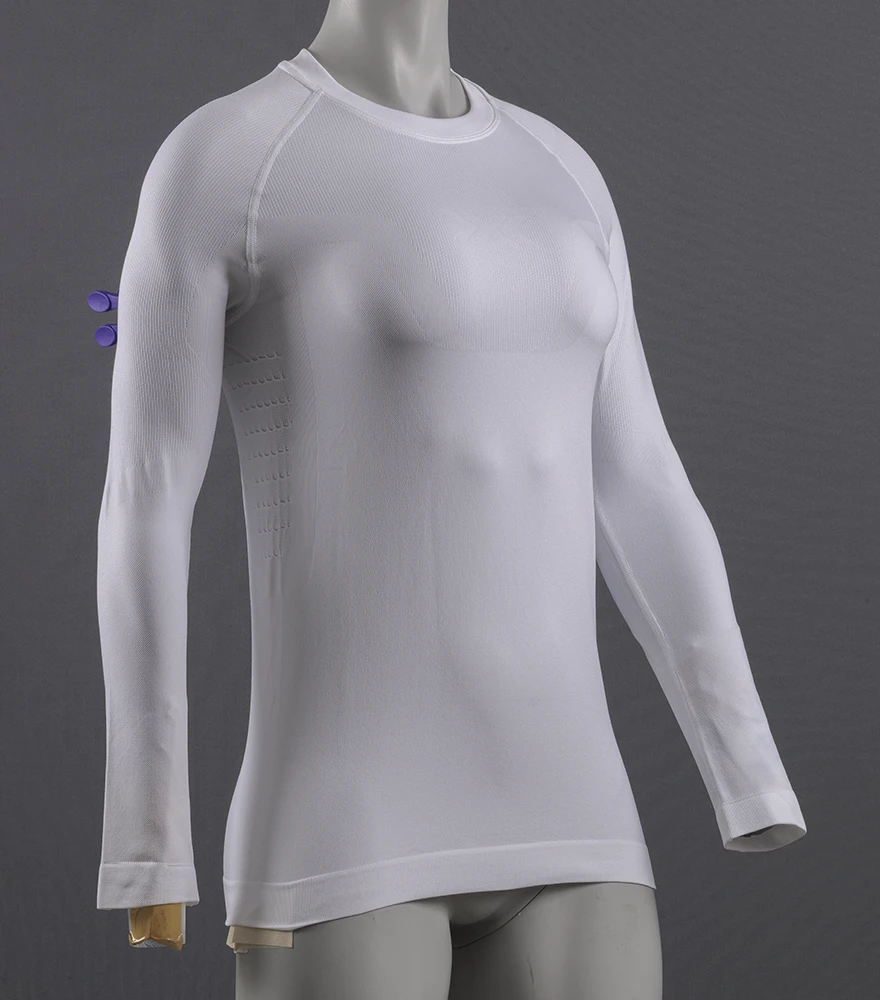 White form-fitting shirt on a mannequin torso with clips and background.