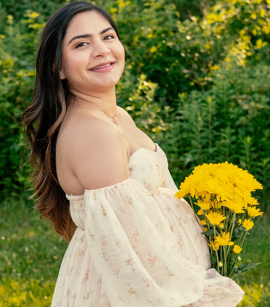 Warm-toned maternity portrait with enhanced color and clean skin tones.