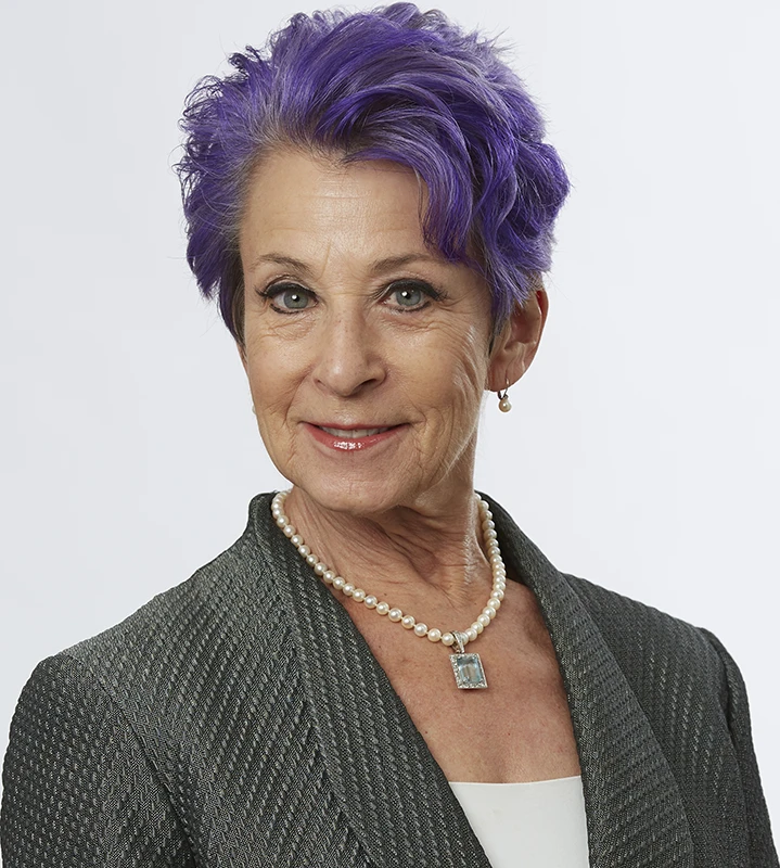 Raw portrait against a studio setup before background removal.