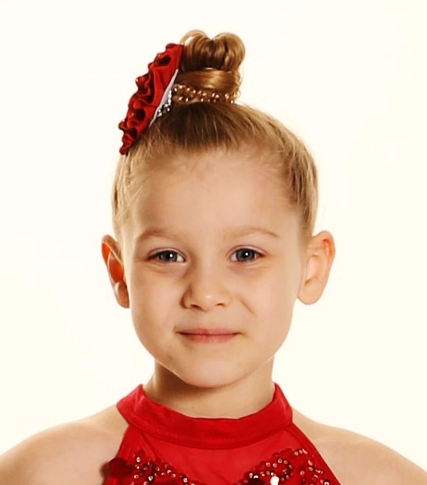 Enhanced portrait of young girl with corrected exposure and vibrant tones.