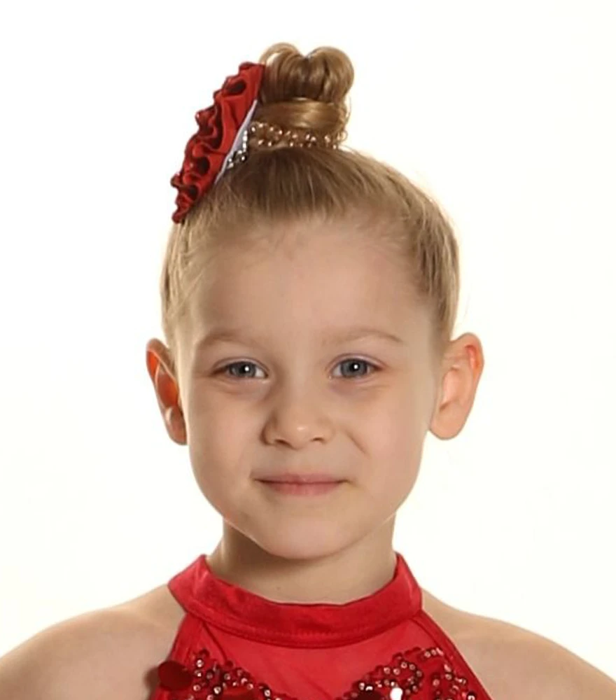 Original underexposed student headshot with darker lighting.