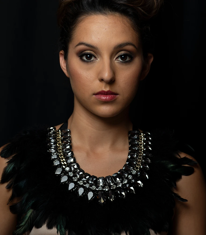 Original portrait with natural lighting and unedited skin detail.