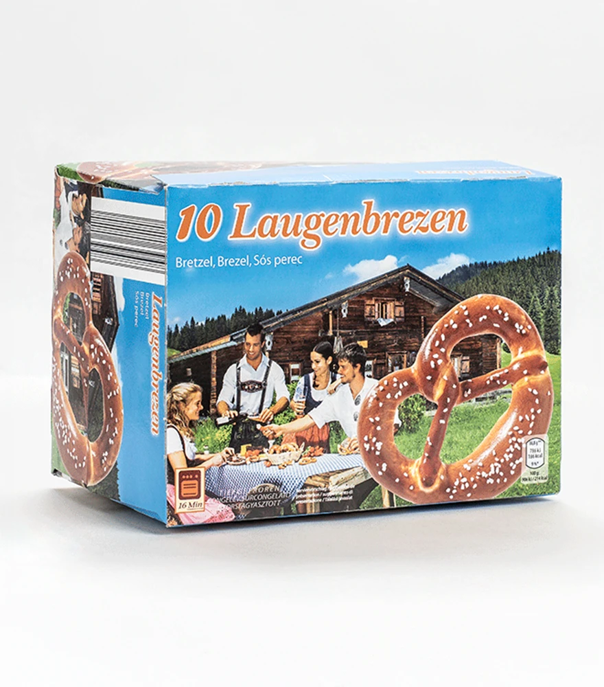 Dust Scratch & Spot Removal_Before Unretouched product image of a frozen pretzel box with visible dust, dirt, and background imperfections.