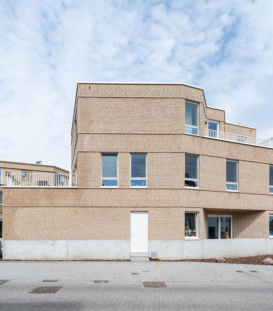 Photo with visible surface damage, dust, and small objects near the base.