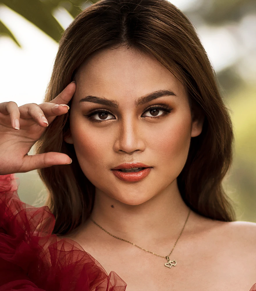 Woman's portrait with flawless skin, enhanced brightness, and high-end beauty retouching.