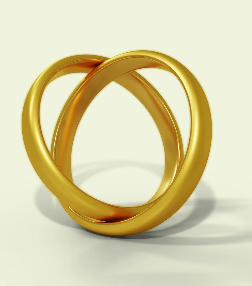 Unedited gold ring with surface glare and lighting imperfections on a yellowish background.