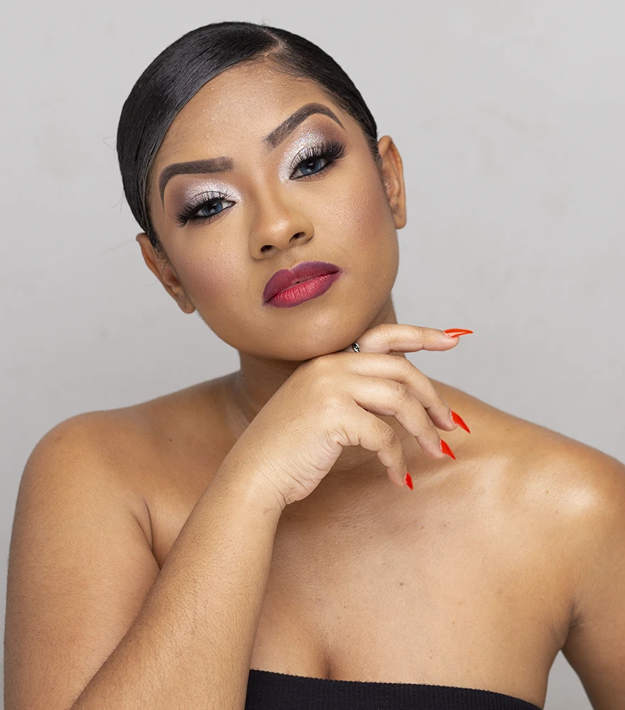 Original model portrait with visible skin texture and minor imperfections.