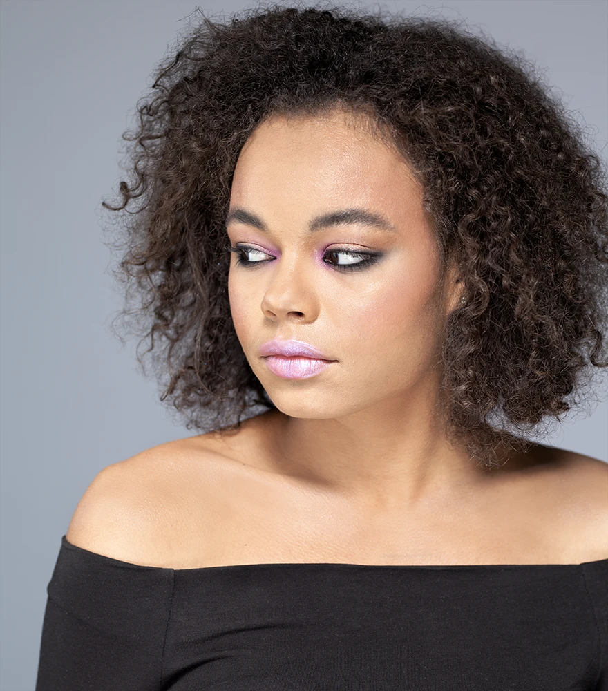 Retouched portrait with controlled highlights and evenly balanced shadows.