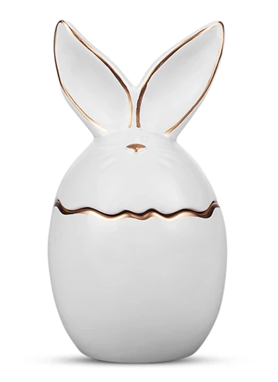 White ceramic bunny-shaped product with natural drop shadow.