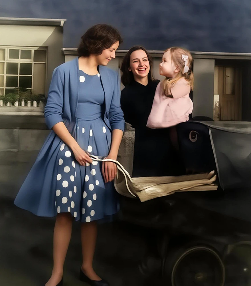 Fully restored vintage photo of two women and a child with repaired tears, enhanced colors, and smooth finish.