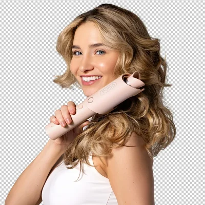 Smiling woman with long curled hair holding a hair styling tool on a transparent background.